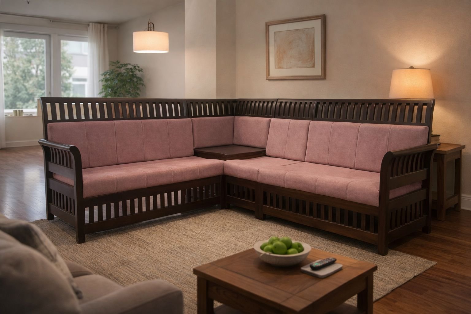 wooden corner sectional sofa with pink cushions.